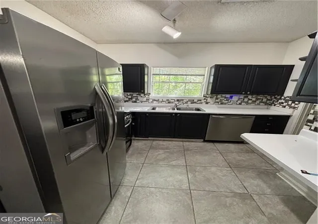 Photo 2 of Townhouse for sale at 584 Windsor St SW, Atlanta, GA 30312 | MLS# 10876365 | Listing updated on 2026-10-27