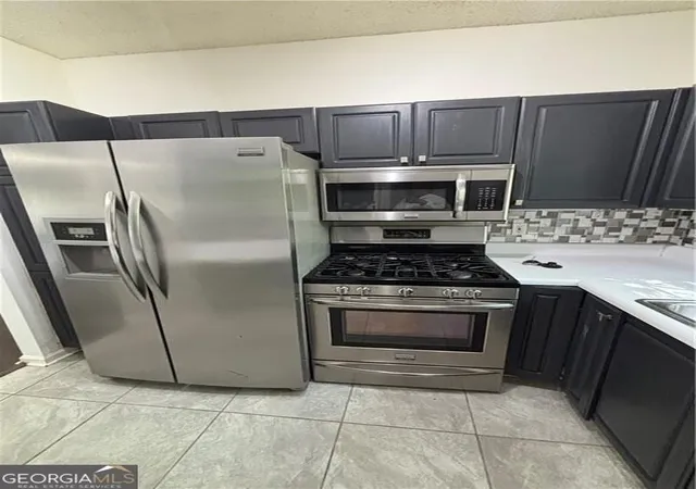 Photo 3 of Townhouse for sale at 584 Windsor St SW, Atlanta, GA 30312 | MLS# 10876365 | Listing updated on 2026-10-27