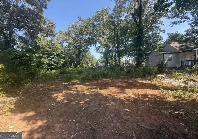 Photo 3 of Single family home for sale at 1120 Oak Knoll Ter SE, Atlanta, GA 30315 | MLS# 10842946 | Listing updated on 2026-10-23