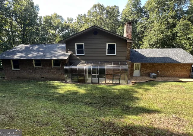 Photo 3 of Single family home for sale at 203 Woodland Dr, Calhoun, GA 30701 | MLS# 10845653 | Listing updated on 2026-09-28