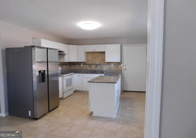 Photo 3 of Single family home for sale at 2625 Rock Chapel Rd, Lithonia, GA 30058 | MLS# 10851231 | Listing updated on 2026-09-24