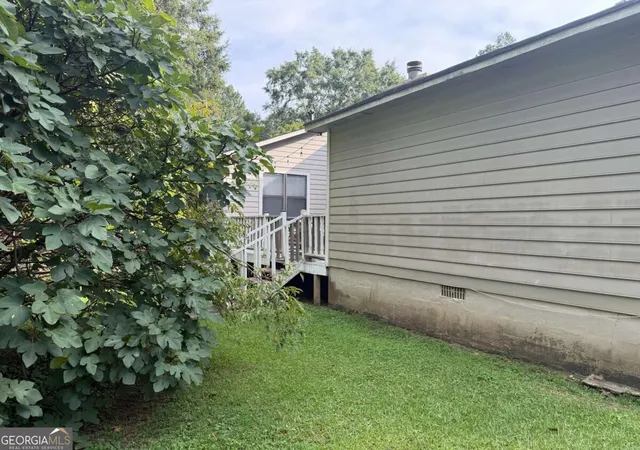 Photo 2 of Single family home for sale at 909 Forest Pointe Way, Jonesboro, GA 30238 | MLS# 10851878 | Listing updated on 2026-10-07