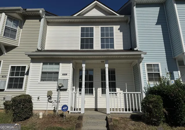 Photo 2 of Townhouse for sale at 5889 Trent Walk Dr, Lithonia, GA 30038 | MLS# 10847039 | Listing updated on 2026-09-20