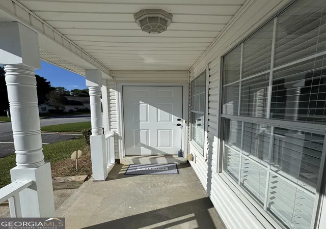 Photo 3 of Townhouse for sale at 5889 Trent Walk Dr, Lithonia, GA 30038 | MLS# 10847039 | Listing updated on 2026-09-20
