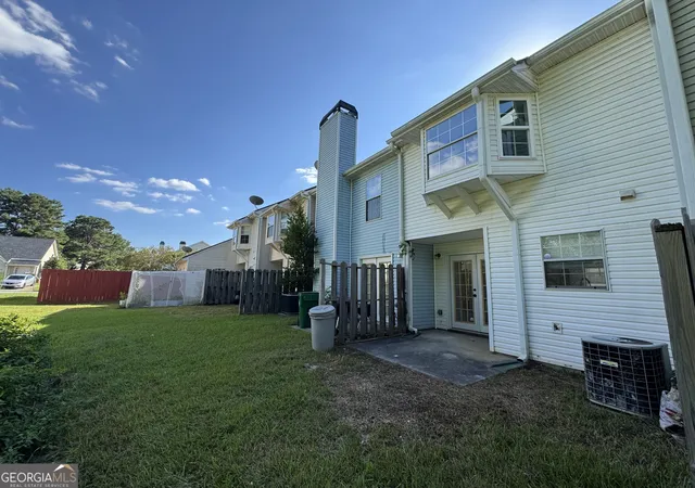 Photo 3 of Townhouse for sale at 5889 Trent Walk Dr, Lithonia, GA 30038 | MLS# 10847039 | Listing updated on 2026-09-20