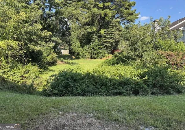 Photo 4 of Townhouse for sale at 5889 Trent Walk Dr, Lithonia, GA 30038 | MLS# 10847039 | Listing updated on 2026-09-20