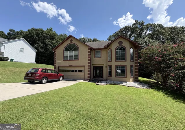 Photo 1 of Single family home for sale at 1667 Rolling Stone Dr, Lithonia, GA 30058 | MLS# 10825864 | Listing updated on 2026-09-23
