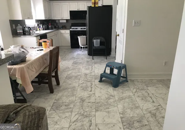 Photo 3 of Single family home for sale at 1667 Rolling Stone Dr, Lithonia, GA 30058 | MLS# 10825864 | Listing updated on 2026-09-23