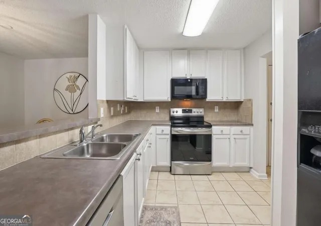 Listing Photo 1 - Condo for sale in building located at 3650 Ashford Dunwoody Rd Ne, Atlanta, GA 30319 - Unit #913