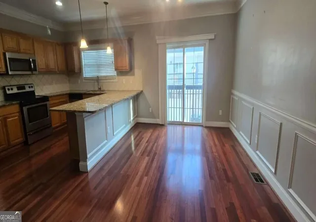 Photo 3 of Townhouse for sale at 1476 Talia Wood Cir NW, Atlanta, GA 30314 | MLS# 10845176 | Listing updated on 2026-10-12