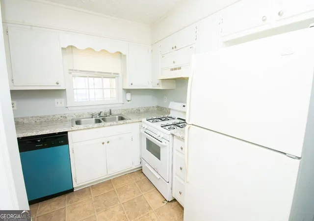 Photo 3 of Multi family home for sale at 6704 Chupp Rd, Lithonia, GA 30058 | MLS# 10847430 | Listing updated on 2026-09-30