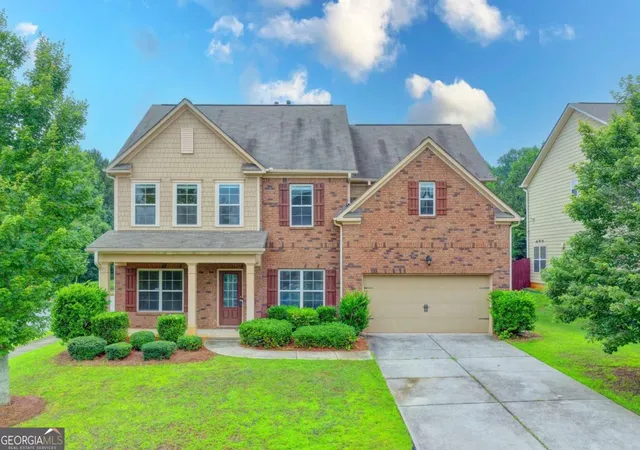 Photo 1 of Single family home for sale at 4228 Woods Crk Ln, Suwanee, GA 30024 | MLS# 10847583 | Listing updated on 2026-09-22