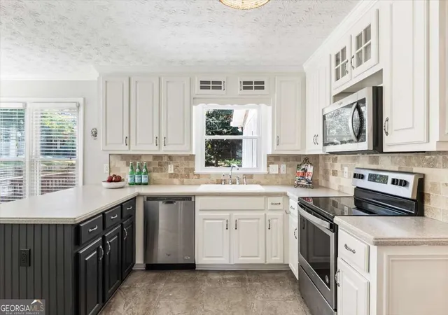 Photo 4 of Single family home for sale at 147 Lakeside Dr NW, Kennesaw, GA 30144 | MLS# 10843965 | Listing updated on 2026-10-19