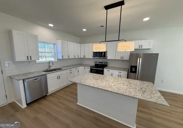 Photo 2 of Sale Pending at 405 E Chappell St, Griffin, GA 30223 | MLS# 10844206 | Listing updated on 2026-09-11