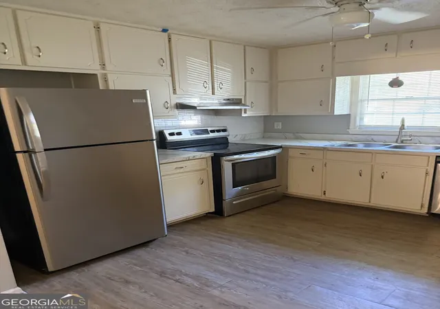 Photo 2 of Single family home for sale at 8454 Alden Dr, Riverdale, GA 30274 | MLS# 10839535 | Listing updated on 2026-09-11
