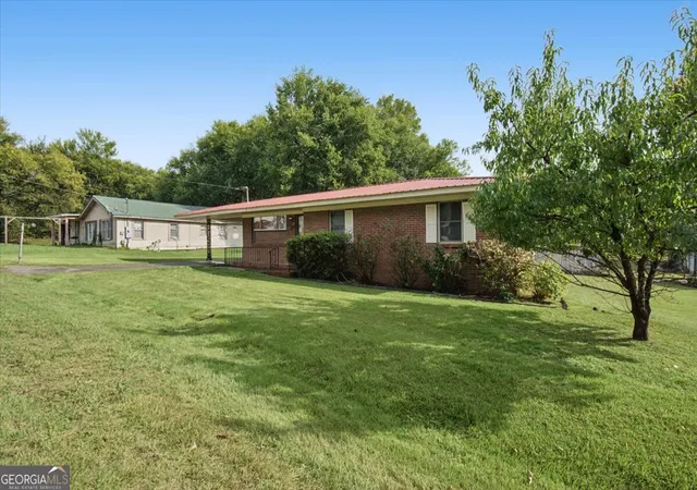 Photo 2 of Single family home for sale at 305 Pine St, Rockmart, GA 30153 | MLS# 10852346 | Listing updated on 2026-10-08