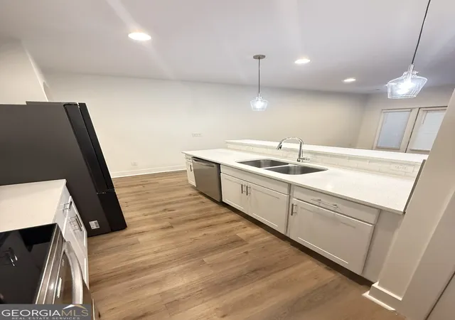 Photo 3 of Townhouse for sale at 5771 Calle Vista Dr, Lithonia, GA 30058 | MLS# 10845300 | Listing updated on 2026-09-27