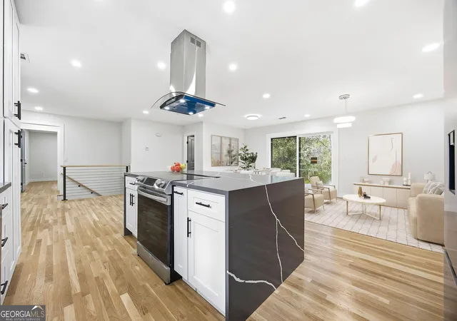 Photo 3 of Single family home for sale at 42 Belle Isle Rd, Atlanta, GA 30342 | MLS# 10835036 | Listing updated on 2026-10-21
