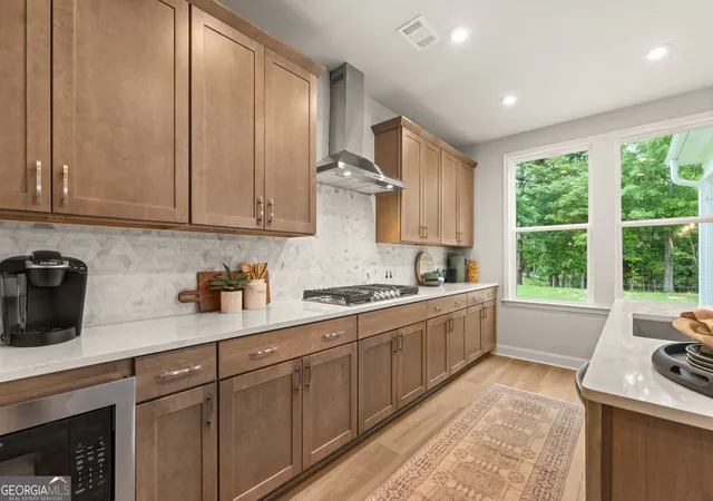 Photo 2 of Single family home for sale at 6954 Melody Ridge Rd, Buford, GA 30518 | MLS# 10833206 | Listing updated on 2026-10-27