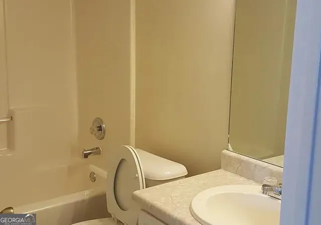 Photo 2 of Townhouse for sale at 7089 Biltmore Tr, Lithonia, GA 30038 | MLS# 10847101 | Listing updated on 2026-09-22