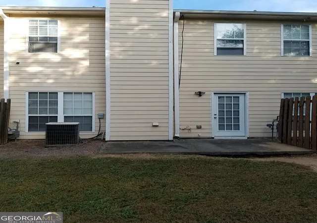 Photo 3 of Townhouse for sale at 7089 Biltmore Tr, Lithonia, GA 30038 | MLS# 10847101 | Listing updated on 2026-09-22