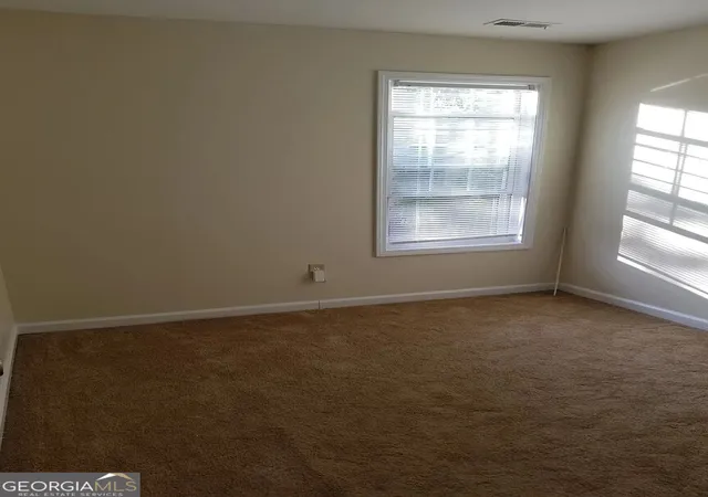 Photo 4 of Townhouse for sale at 7089 Biltmore Tr, Lithonia, GA 30038 | MLS# 10847101 | Listing updated on 2026-09-22