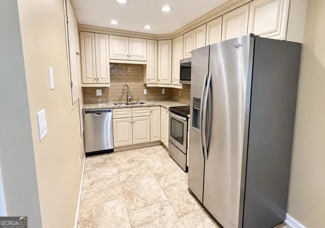Photo 2 of Single family home for sale at 5104 Rock Glen Dr, Stone Mountain, GA 30088 | MLS# 10847379 | Listing updated on 2026-10-05