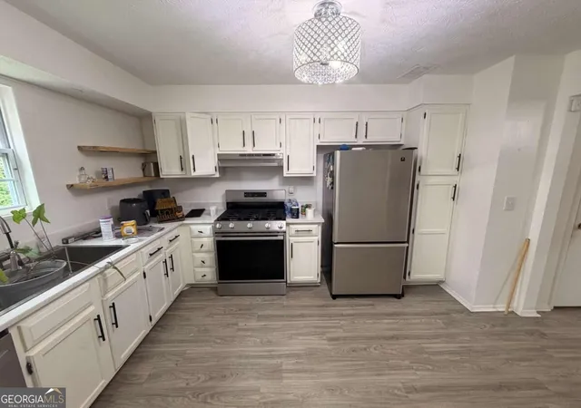 Photo 4 of Single family home for sale at 6161 Saint Charles Ct, Lithonia, GA 30058 | MLS# 10844615 | Listing updated on 2026-09-25