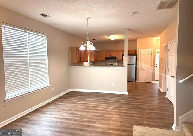 Photo 4 of Townhouse for sale at 11326 Kayla Dr, Hampton, GA 30228 | MLS# 10852856 | Listing updated on 2026-10-09