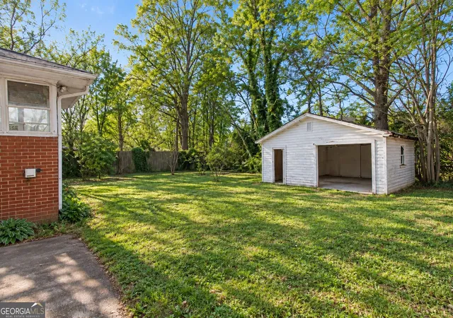 Photo 3 of Single family home for sale at 154 Privette Rd Sw, Marietta, GA 30008 | MLS# 10692329 | Listing updated on 2026-09-11