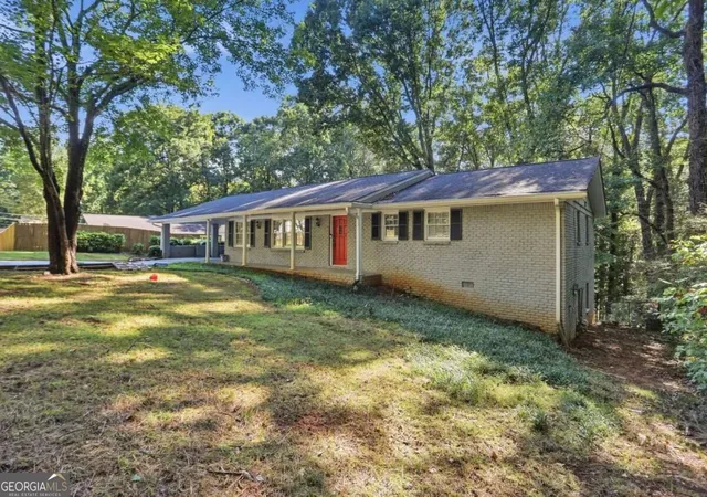Photo 3 of Single family home for sale at 5528 Fern Crk Dr Sw, Lilburn, GA 30047 | MLS# 10848426 | Listing updated on 2026-10-07