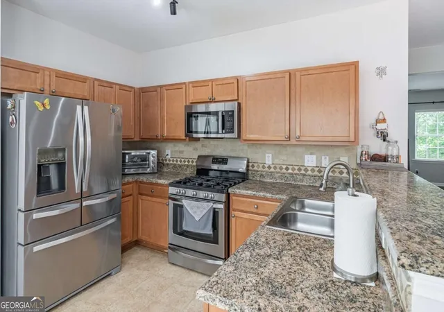 Photo 3 of Townhouse for sale at 1216 Park Pass Way, Suwanee, GA 30024 | MLS# 10850612 | Listing updated on 2026-10-06