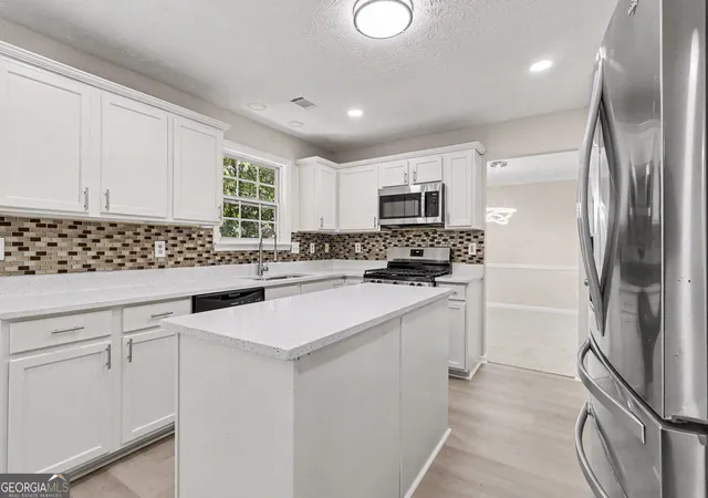 Photo 4 of Single family home for sale at 1128 Mitford Ln, Dacula, GA 30019 | MLS# 10876262 | Listing updated on 2026-10-30
