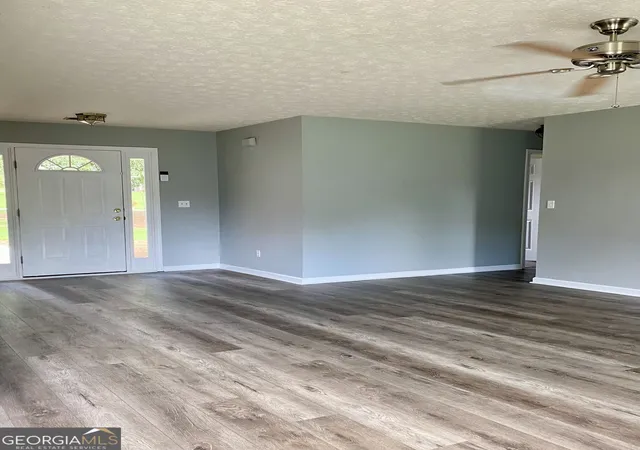 Photo 4 of Single family home for sale at 203 Cambridge Dr, Loganville, GA 30052 | MLS# 10831486 | Listing updated on 2026-09-13