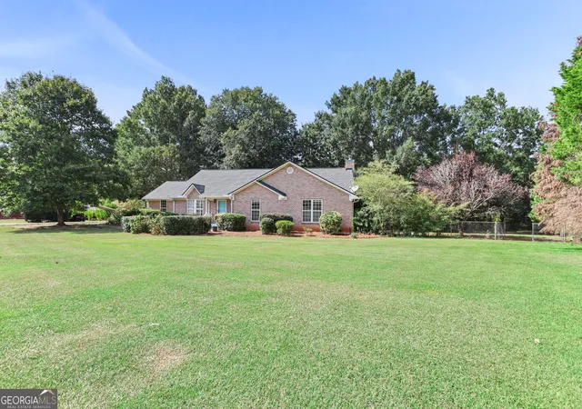 Photo 2 of Single family home for sale at 448 Minter Dr, Hampton, GA 30228 | MLS# 10841086 | Listing updated on 2026-09-16