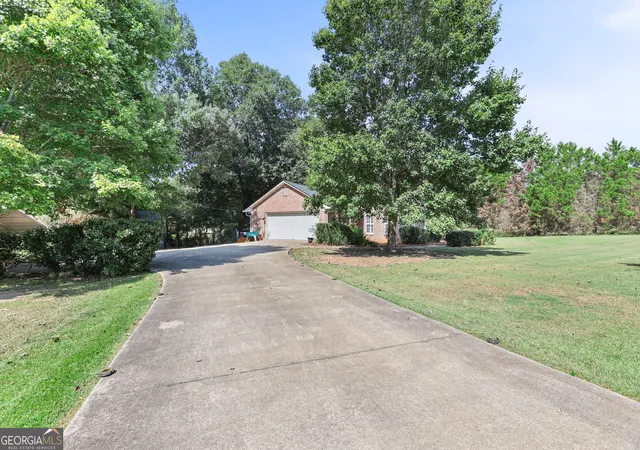 Photo 3 of Single family home for sale at 448 Minter Dr, Hampton, GA 30228 | MLS# 10841086 | Listing updated on 2026-09-16