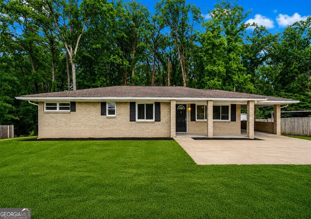 Single family home for sale at 677 N Hairston Rd, Stone Mountain, GA 30083 | MLS# 10835544