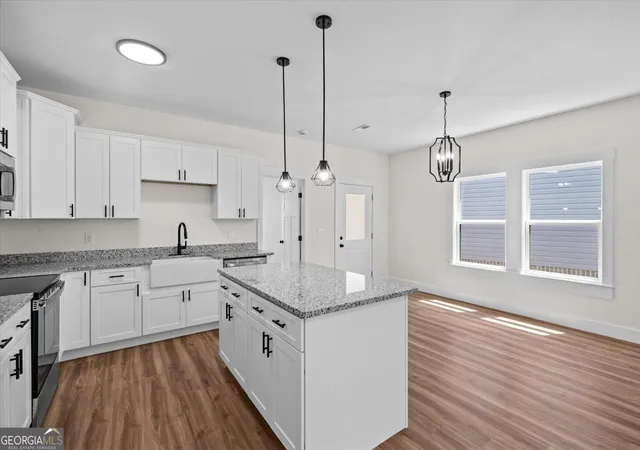 Photo 3 of Single family home for sale at 144 Washington St, Dalton, GA 30721 | MLS# 10840397 | Listing updated on 2026-09-18