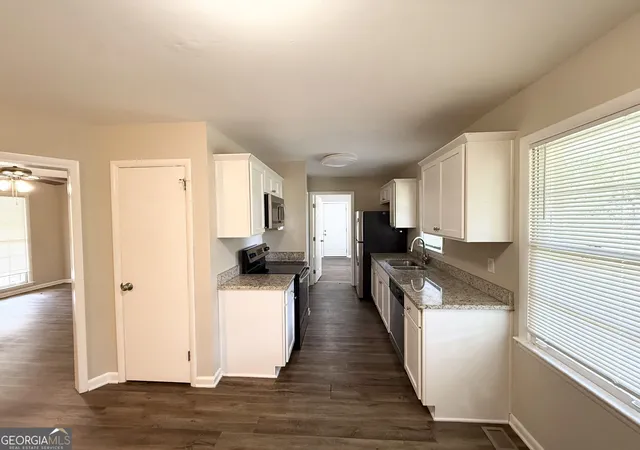 Photo 3 of Single family home for sale at 411 Pineland Rd SW, Mableton, GA 30126 | MLS# 10849228 | Listing updated on 2026-10-03