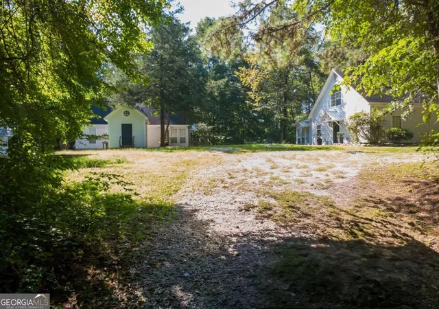 Photo 1 of Multi family home for sale at 406 Covered Brg Rd, Covington, GA 30016 | MLS# 10839554 | Listing updated on 2026-09-17