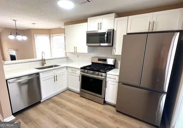 Photo 4 of Townhouse for sale at 7941 Creekstone Way, Riverdale, GA 30274 | MLS# 10840488 | Listing updated on 2026-09-18