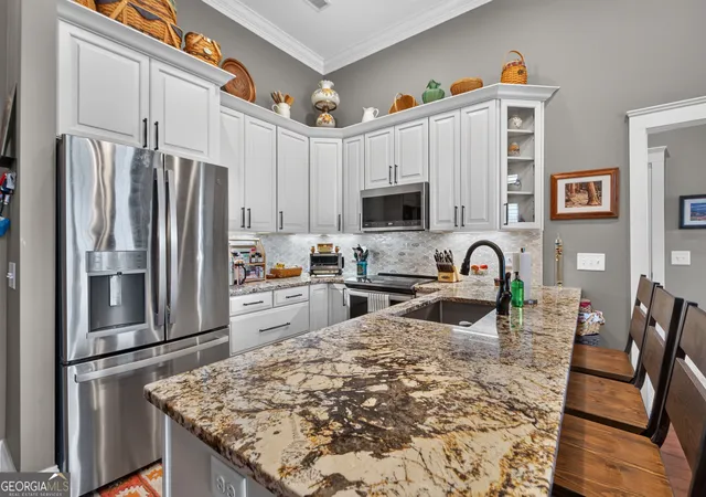 Photo 2 of Condo for sale at 1 E 3rd Avenue #409, Rome, GA 30161 | MLS# 10837704 | Listing updated on 2026-09-15
