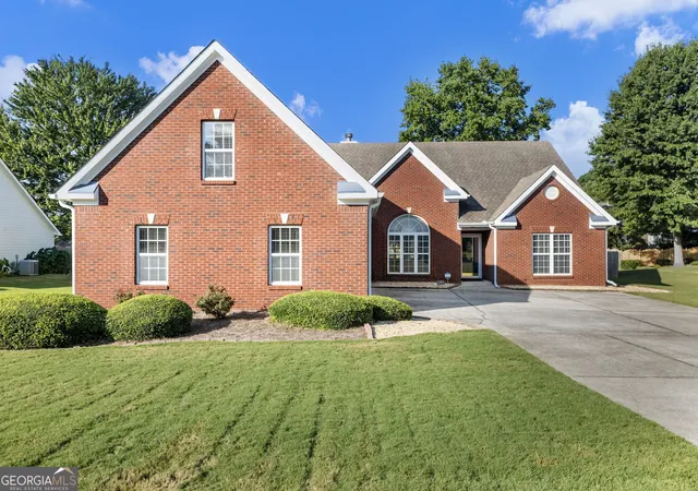 Photo 1 of Sale Pending at 1256 Oakmont Ridge Dr, Lawrenceville, GA 30043 | MLS# 10850072 | Listing updated on 2026-10-05