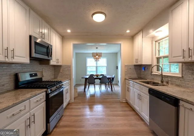 Photo 3 of Single family home for sale at 539 Fond Du Lac Dr, Stone Mountain, GA 30088 | MLS# 10844414 | Listing updated on 2026-09-15