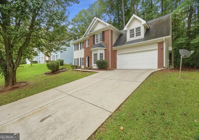 Photo 2 of Single family home for sale at 7145 Lone Oak Tr, Lithonia, GA 30058 | MLS# 10852853 | Listing updated on 2026-09-25