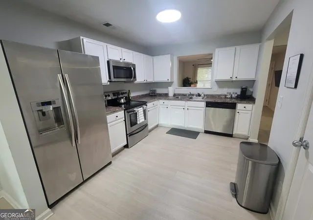 Photo 3 of Townhouse for sale at 2619 Parrish Ct, Lithonia, GA 30038 | MLS# 10844326 | Listing updated on 2026-09-25