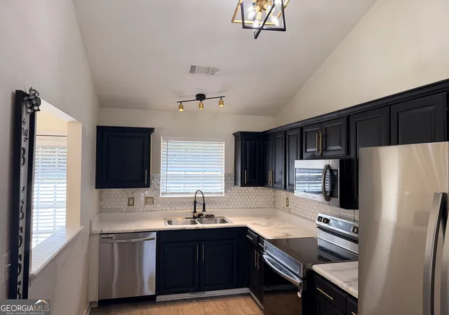 Photo 3 of Single family home for sale at 5867 Amerson Ln, Ellenwood, GA 30294 | MLS# 10844896 | Listing updated on 2026-10-02