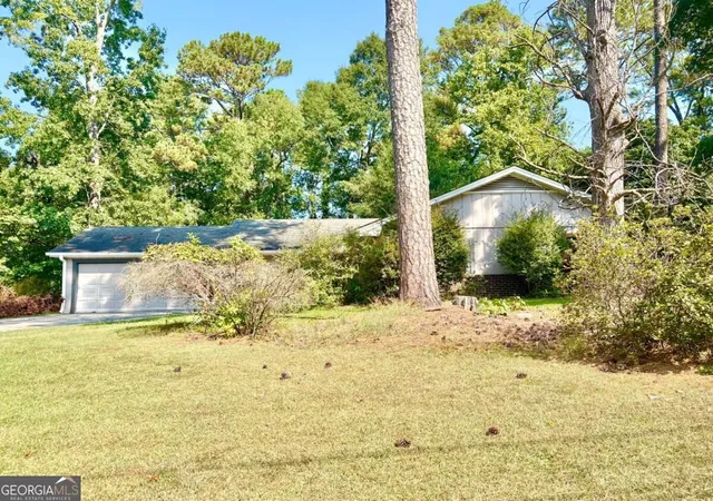 Photo 3 of Single family home for sale at 1398 Fairfield Dr Sw, Lilburn, GA 30047 | MLS# 10840371 | Listing updated on 2026-09-18