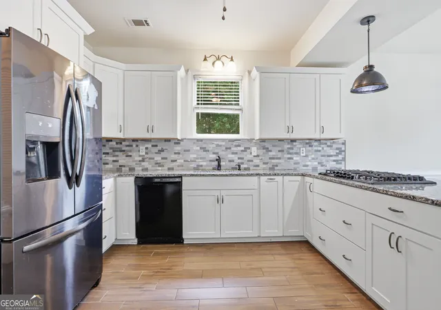 Photo 2 of Single family home for sale at 1102 Timber Glen Ct Sw, Lilburn, GA 30047 | MLS# 10848617 | Listing updated on 2026-10-02