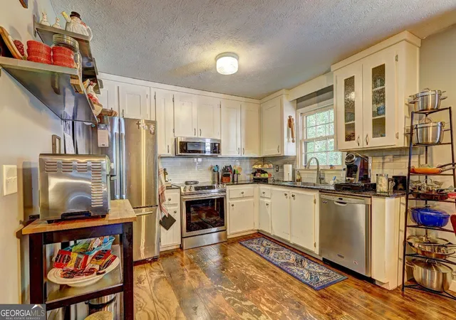 Photo 4 of Single family home for sale at 346 Dock Lathem Trl, Ball Ground, GA 30107 | MLS# 10847242 | Listing updated on 2026-09-30